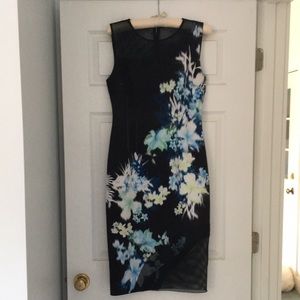 Very cool print dress with mesh inserts, size 6.